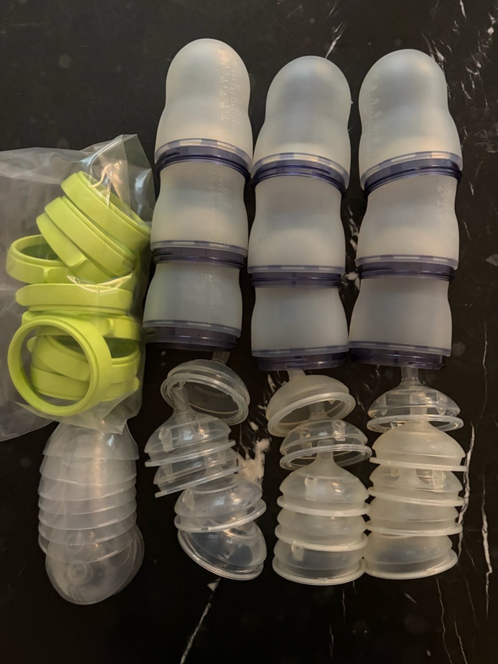 9 Comotomo bottles (8oz) with assorted nipples
